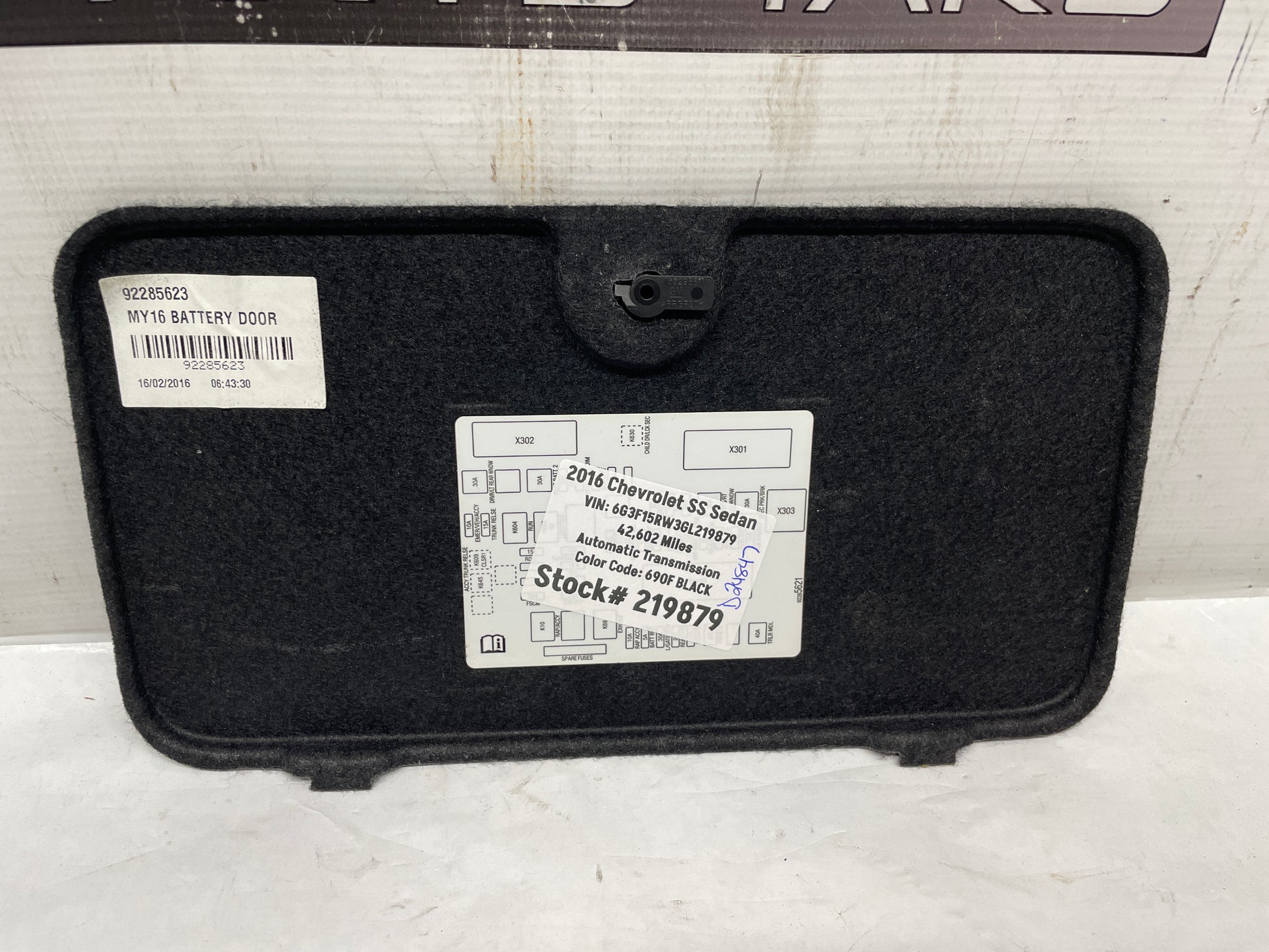 2016 SS Sedan Battery Stowage Access Hole Door Trim Felt Carpet OEM - Day's Parts Yard