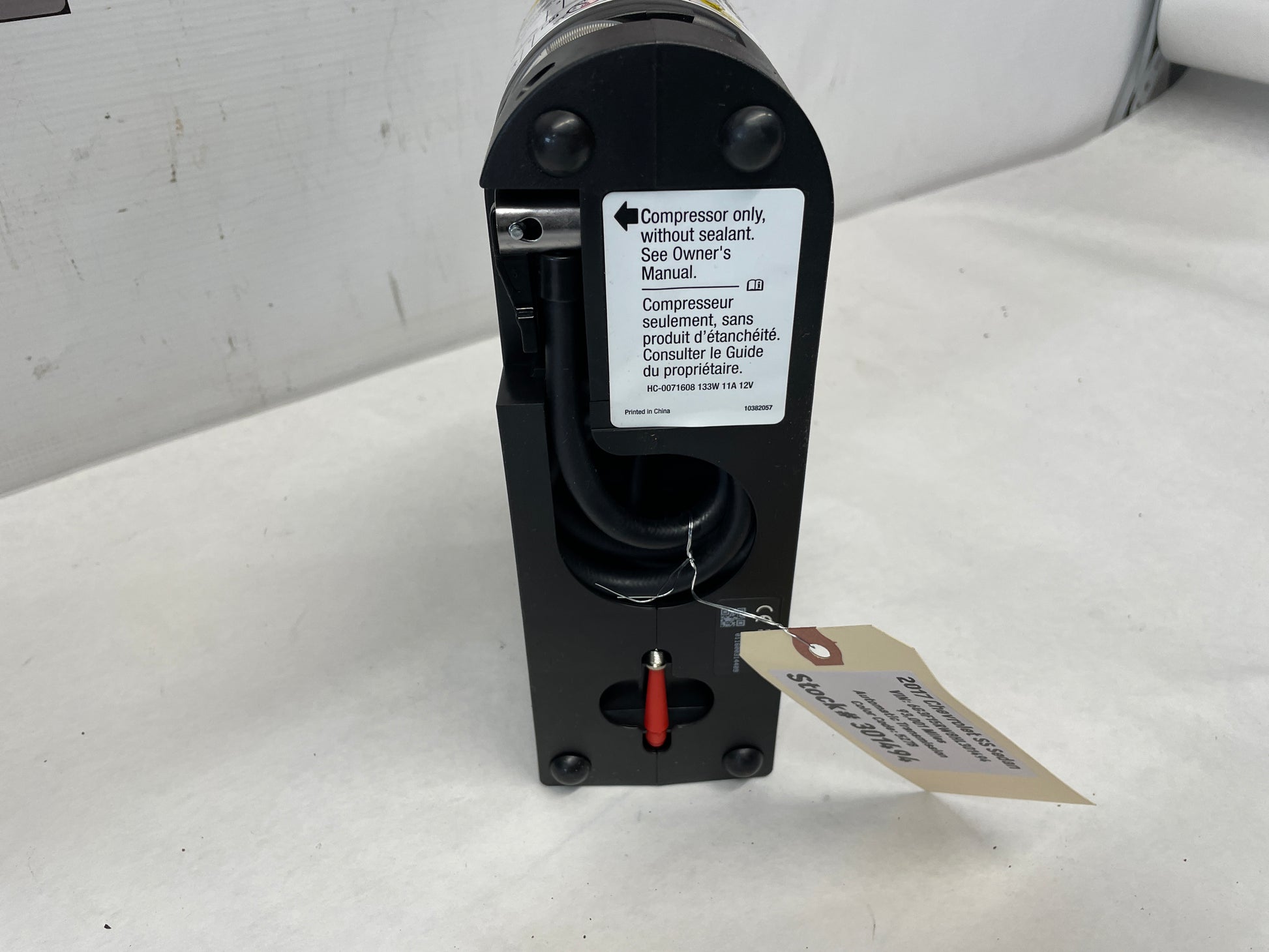 2017 Chevy SS Sedan Spare Tire Sealant Container & Compressor Assembly OEM - Day's Parts Yard