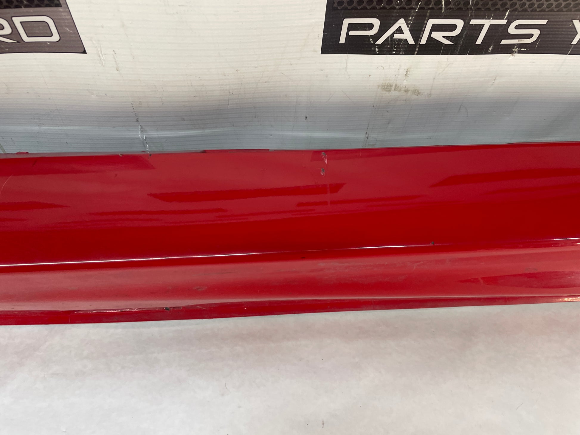 2009 Pontiac G8 GT LH Driver Rocker Molding Side Skirt Panel Red OEM - Day's Parts Yard
