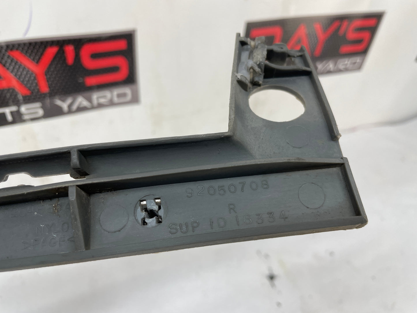 2004 Pontiac GTO RH Passenger Front Bumper Fender Bracket Guide Support OEM