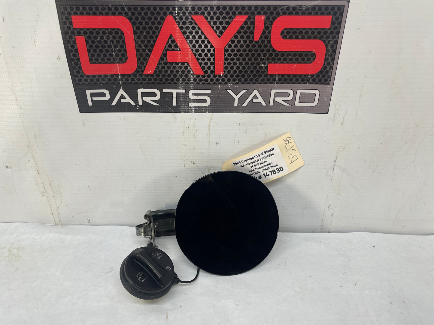 2009 Cadillac CTS-V Sedan Fuel Gas Lid Tank Door Cover w/ Cap Black OEM - Day's Parts Yard