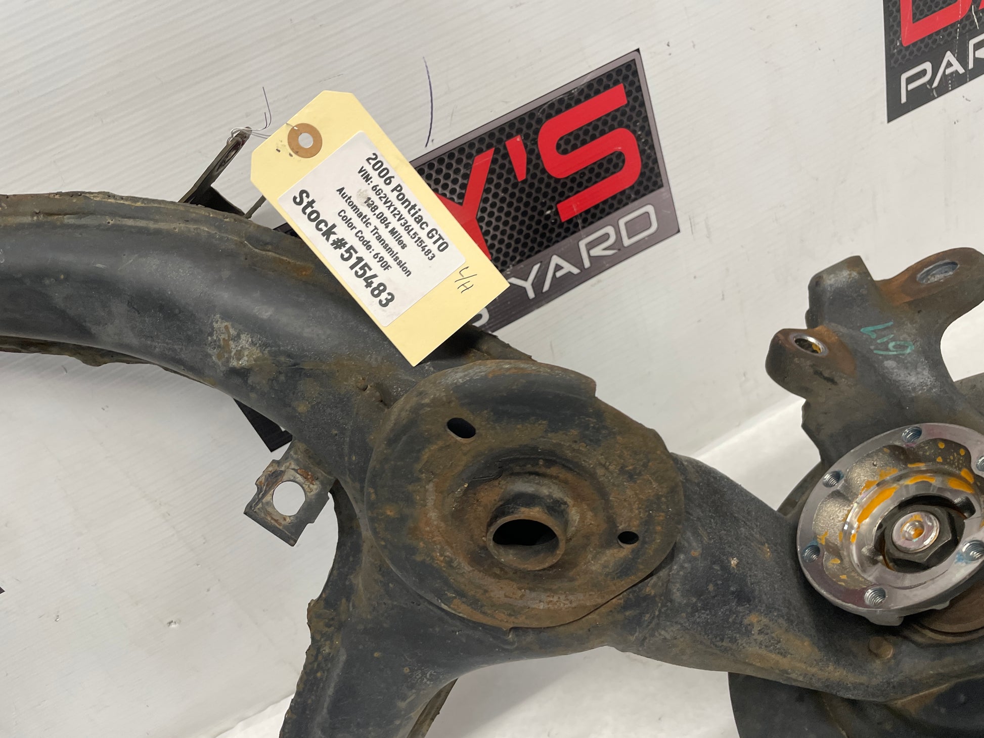 2006 Pontiac GTO LH Driver Rear Suspension Spindle Hub Knuckle Control Arm OEM - Day's Parts Yard