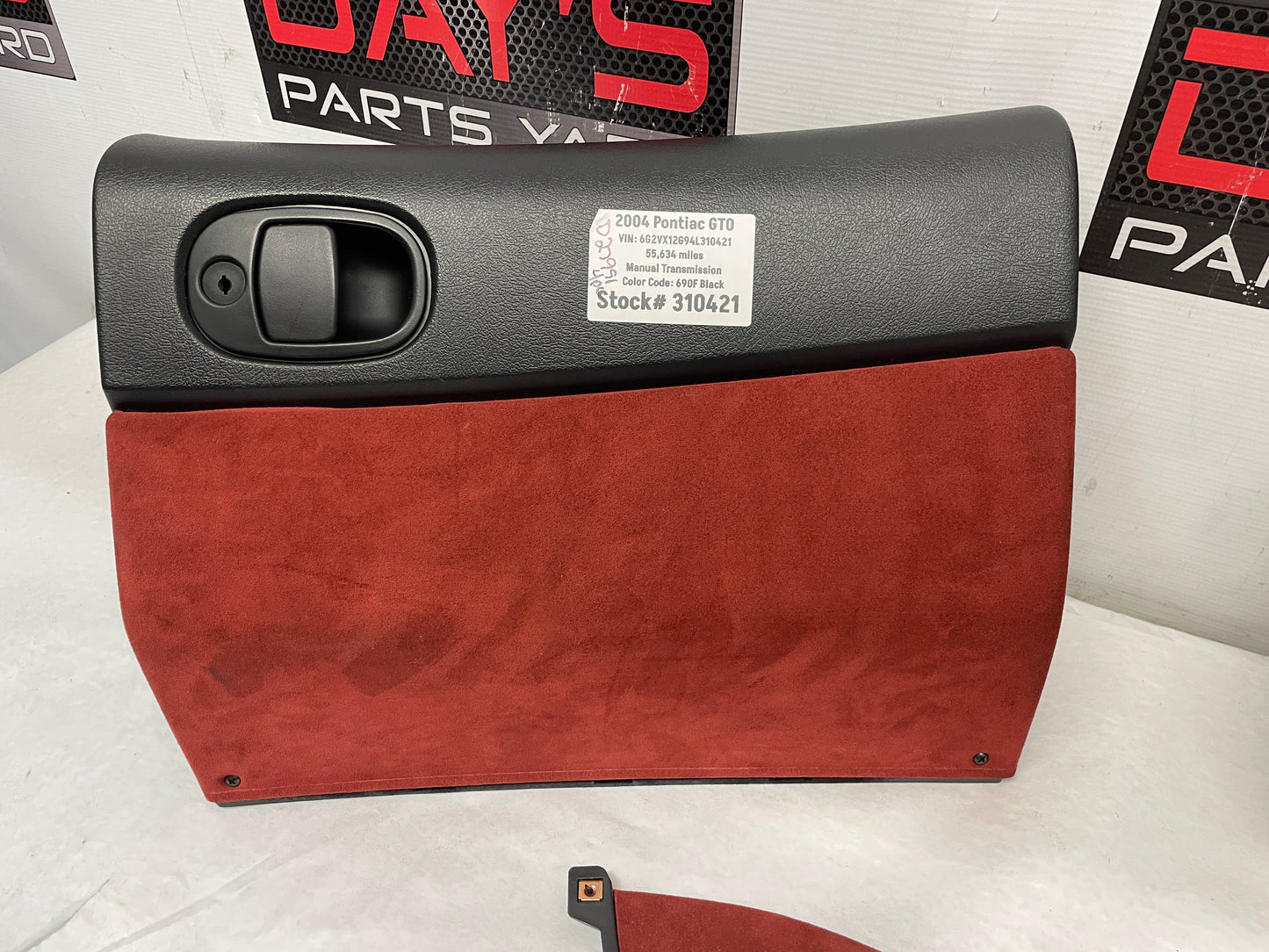 2004 Pontiac GTO Red Interior Trim Glove Box Knee Bolster Console Suedes OEM - Day's Parts Yard