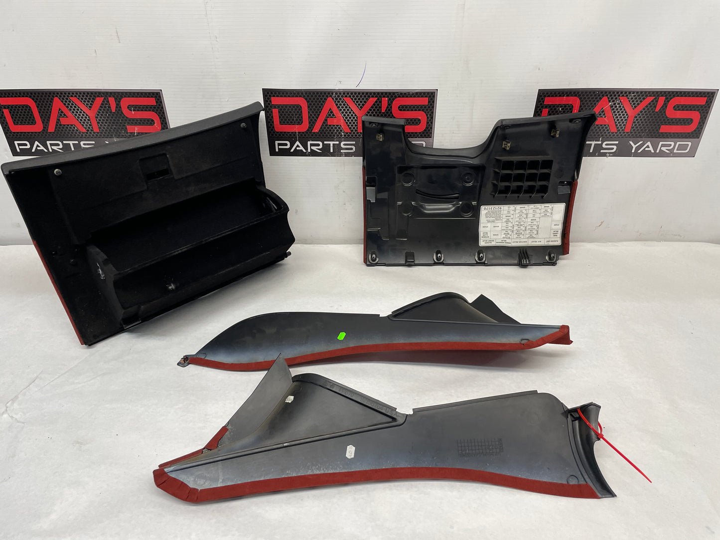 2004 Pontiac GTO Red Interior Trim Glove Box Knee Bolster Console Suedes OEM - Day's Parts Yard