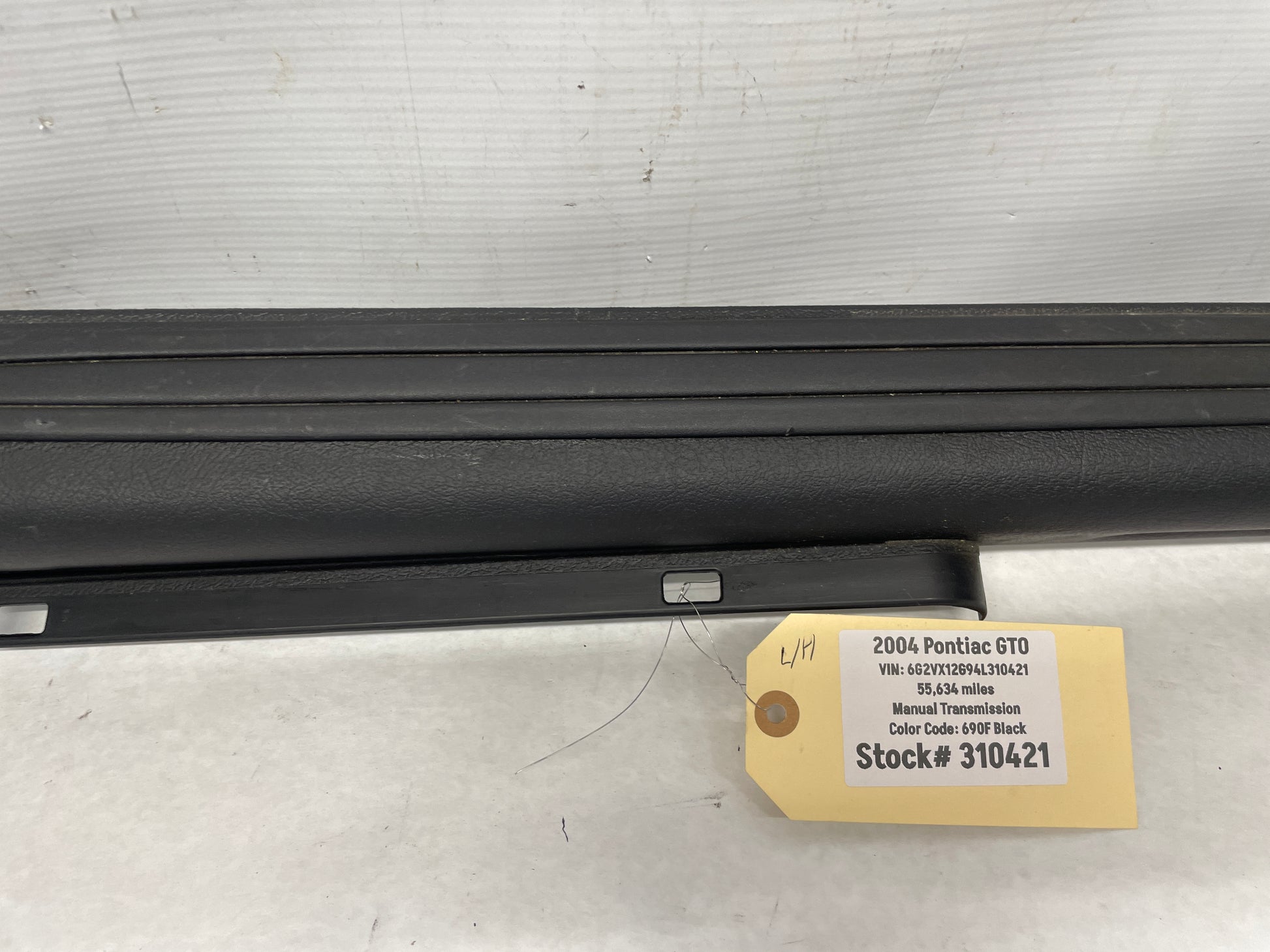 2004 Pontiac GTO LH Driver Interior Sill Carpet Retainer Trim Cover Panel OEM - Day's Parts Yard