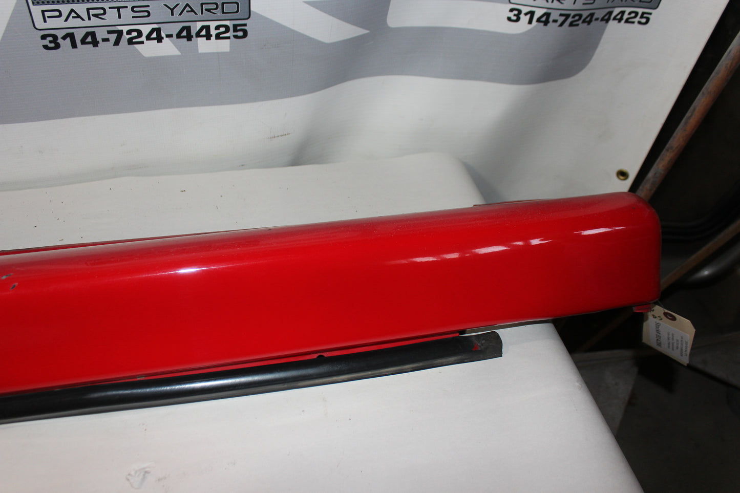 2006 Pontiac GTO LH Driver Rocker Molding Panel Red OEM - Day's Parts Yard