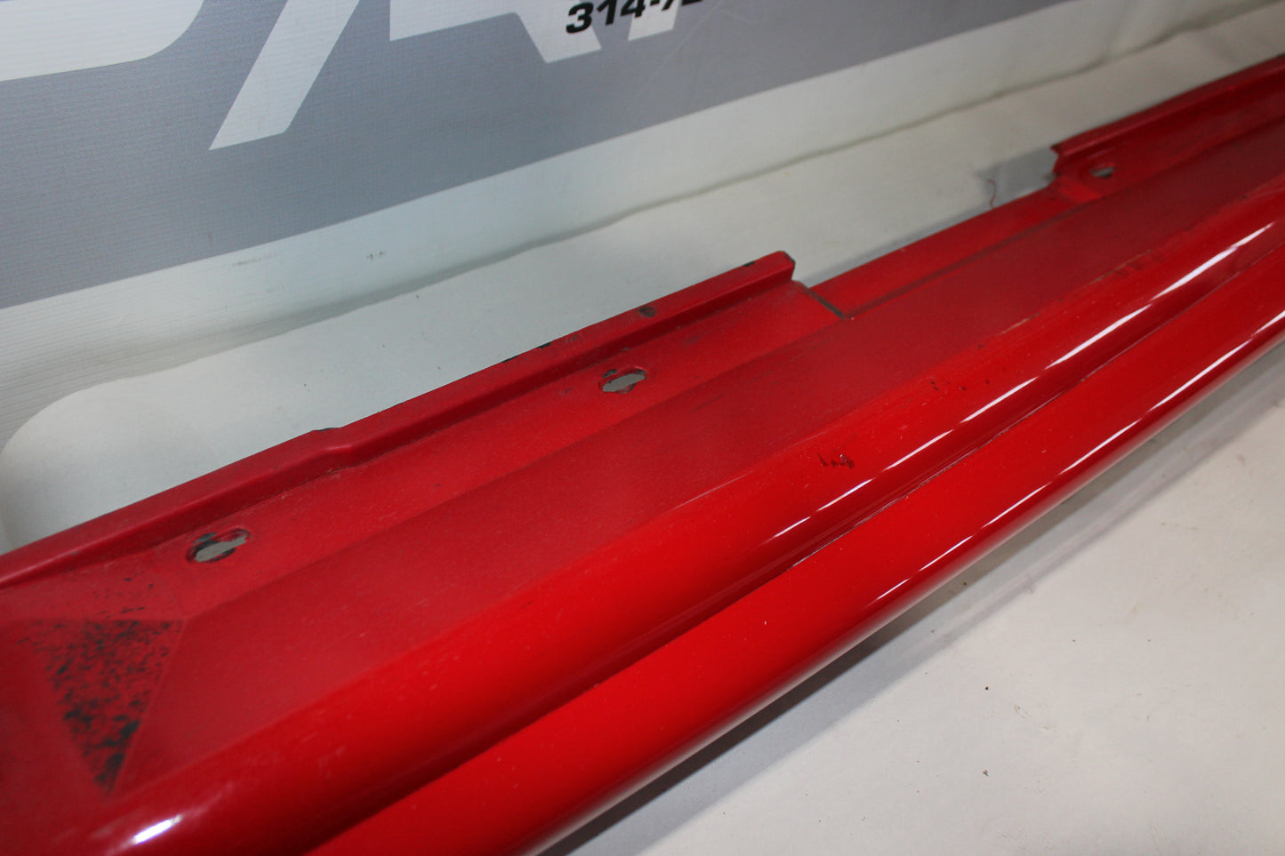 2006 Pontiac GTO LH Driver Rocker Molding Panel Red OEM - Day's Parts Yard