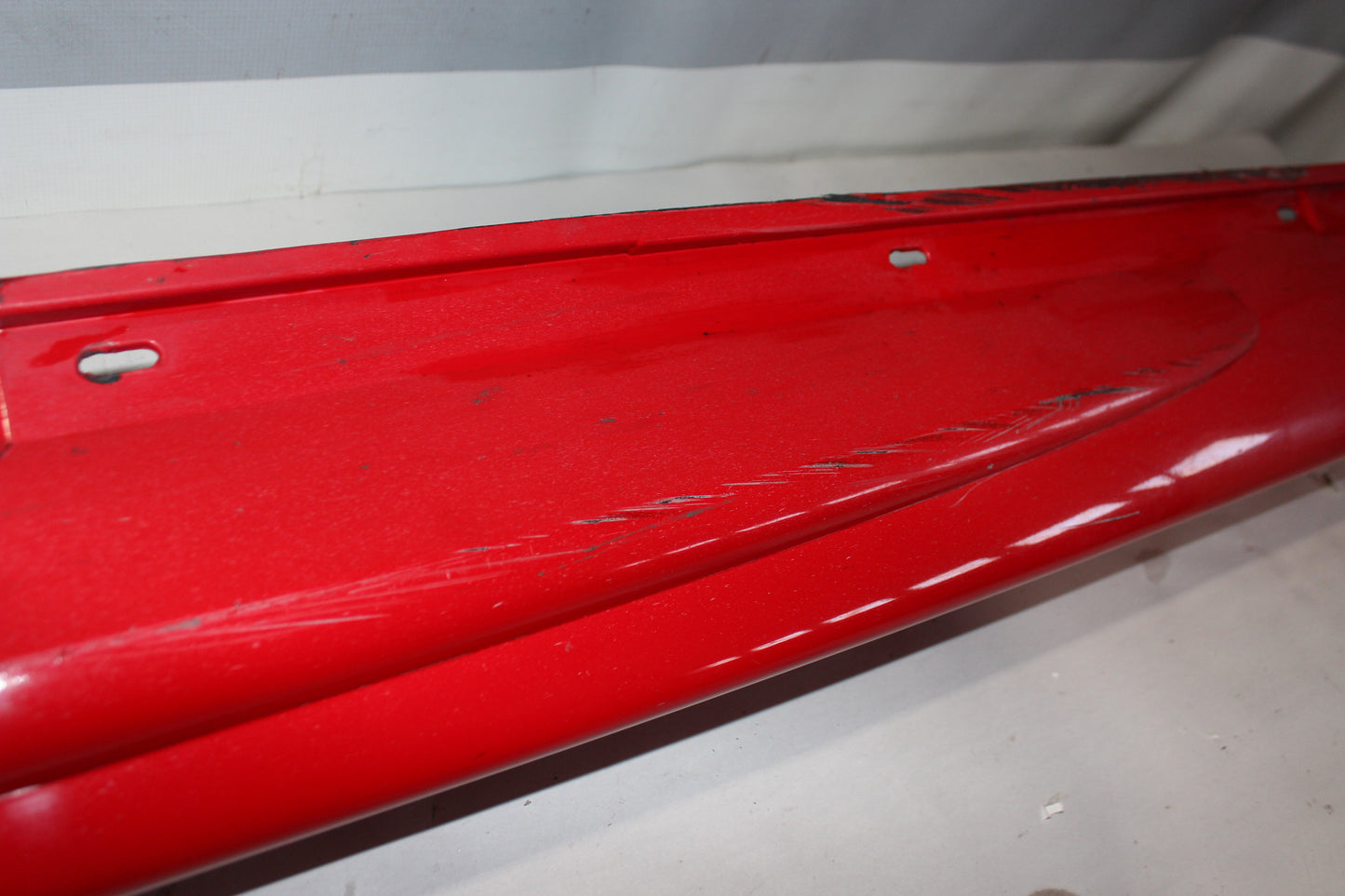 2006 Pontiac GTO LH Driver Rocker Molding Panel Red OEM - Day's Parts Yard