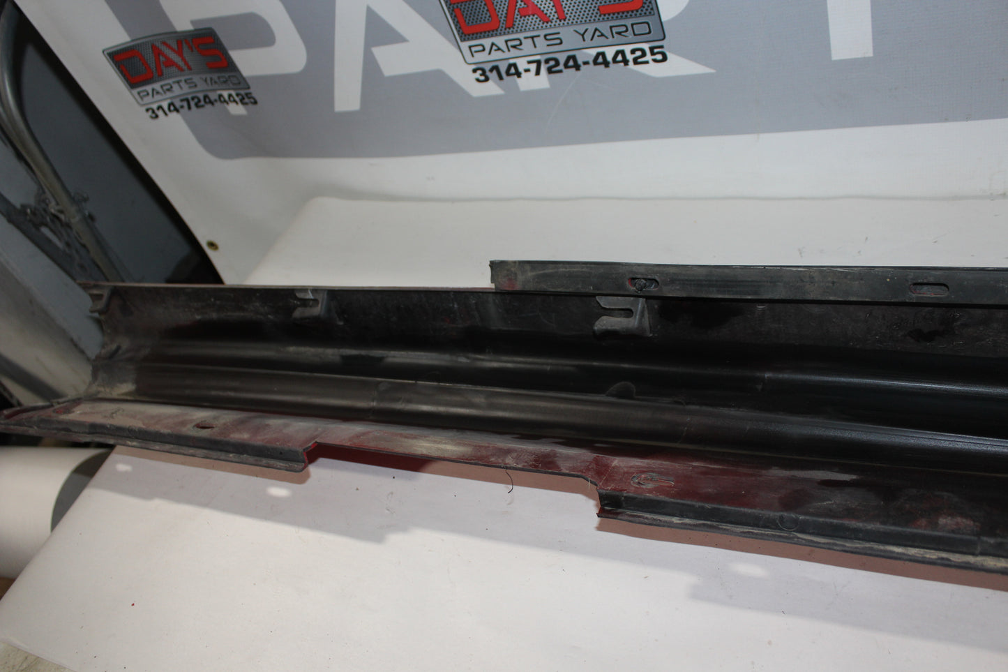 2006 Pontiac GTO LH Driver Rocker Molding Panel Red OEM - Day's Parts Yard