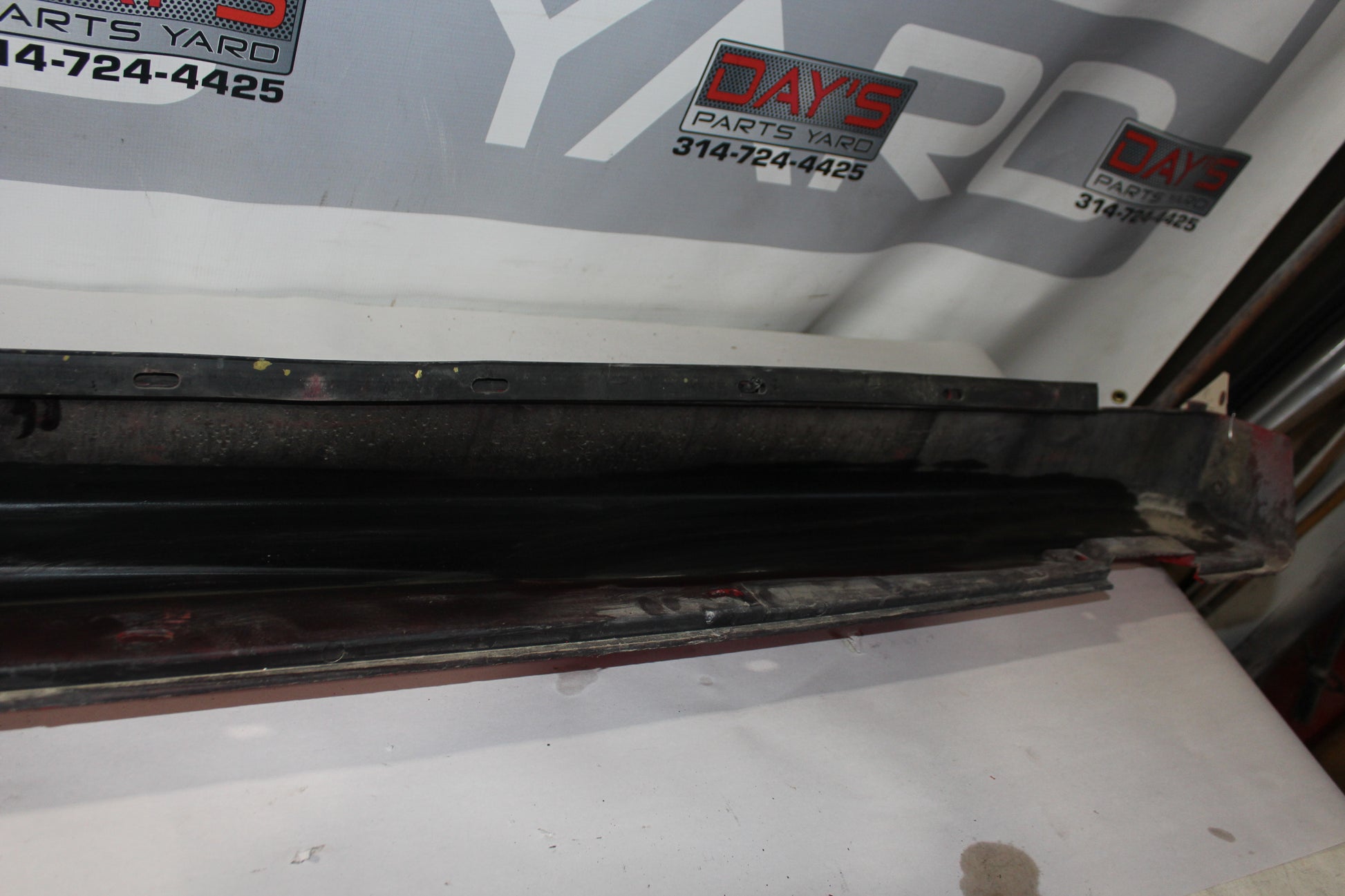 2006 Pontiac GTO LH Driver Rocker Molding Panel Red OEM - Day's Parts Yard